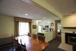 Dining Room next to Kitchen with Breakfast Bar in condo At Waterville Valley